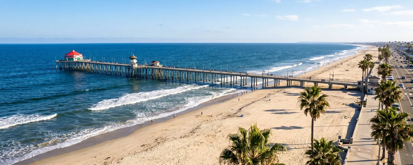 Buy a home in Huntington Beach CA — get 1% cash back Huntington Beach Surf City USA with the iconic pier and wide white-sand beach along the Pacific Ocean — Portfolio Home Realty buyer agent
